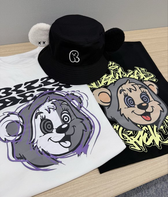 The image features a white t-shirt with a graphic design depicting two cartoon animals. There are also other designs scattered around the shirt. The text on the photo suggests that these designs have some sort of relevance to web3 or blockchain, possibly representing concepts related to cryptocurrency or smart contracts. The overall context seems to be related to the post about "@useTria", which is a user interface for the Ethereum network or a similar blockchain project.