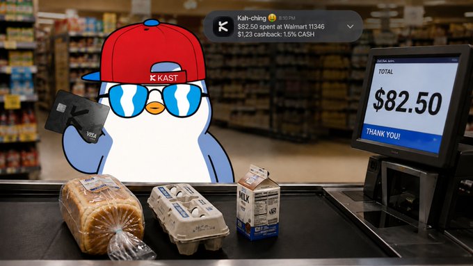 A cartoon penguin mascot wearing a red 'KAST' cap and sunglasses holds a credit card at a Walmart checkout, with a notification showing '$82.50 spent at Walmart 11346, $1.23 cashback: 1.5% CASH' and items including bread, eggs, and milk on the conveyor belt.