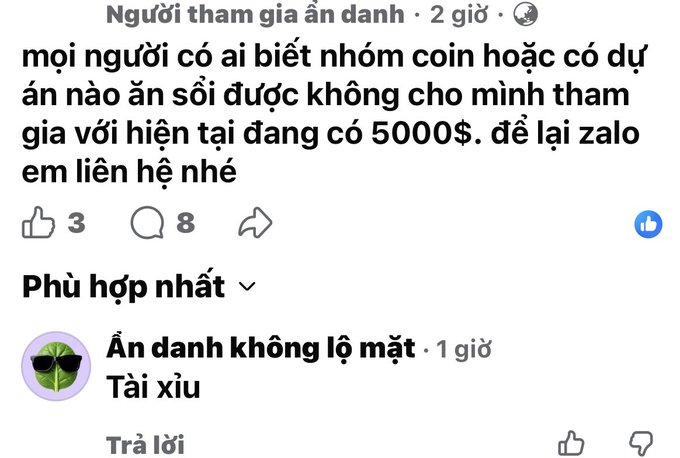 Vietnamese Facebook comment asking to join a coin group with $5000, with a reply 'Tài xỉu' (meaning dice game/gambling).
