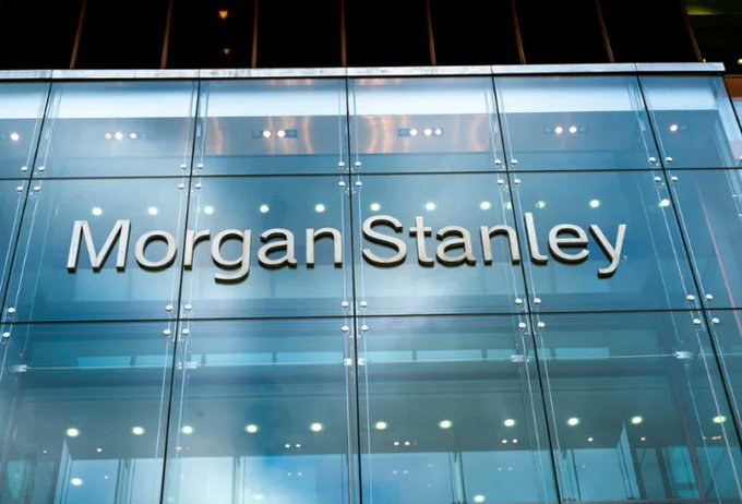 The exterior of a Morgan Stanley building featuring the company name displayed in silver letters on a glass facade.