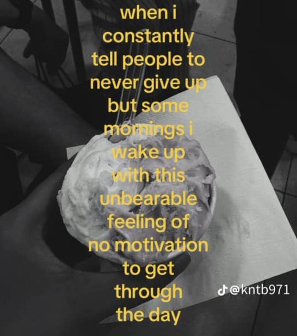 An image of a frosted donut with an overlaid caption: 'when i constantly tell people to never give up but some mornings i wake up with this unbearable feeling of no motivation to get through the day'.