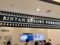 A banner reading 'BINTAN RESORTS CAKE' with a logo, displayed at what appears to be an exhibition booth.