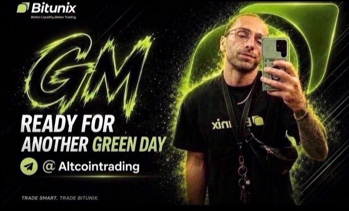 Bitunix cryptocurrency trading advertisement featuring a man taking a mirror selfie with a phone, with text 'GM - READY FOR ANOTHER GREEN DAY' and Telegram handle @Altcointrading.