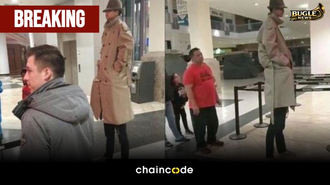 A news graphic from 'BUGLE NEWS' with a 'BREAKING' banner, showing surveillance-style footage of a tall person in a trench coat and wide-brimmed hat in a mall, with the 'chaincode' logo at the bottom.