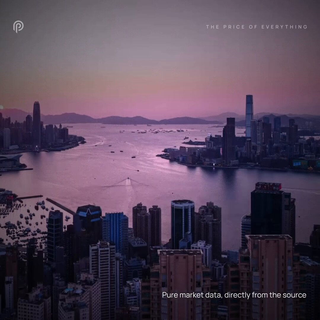 The image shows a city skyline with tall buildings, including a prominent skyscraper that dominates the scene. The sky above the city appears to be pinkish-orange, suggesting either sunrise or sunset. The caption of the image reads "Good night. Who's active now? I think this is a much bigger step for Pyth Network @PythNetwork than many people realize. A lot of crypto users still mostly focus on US equities and crypto markets. But Asia is one of the largest capital markets in the world. And Hong Kong has".