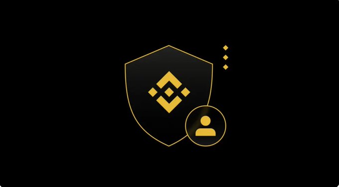 The image shows the Binance logo inside a gold shield outline with a user profile icon, symbolizing account security. This visually reinforces the post's message about enhancing Binance account protection beyond just a strong password, aligning with the 5 security steps mentioned such as using RSA keys and restricting API access by IP address.