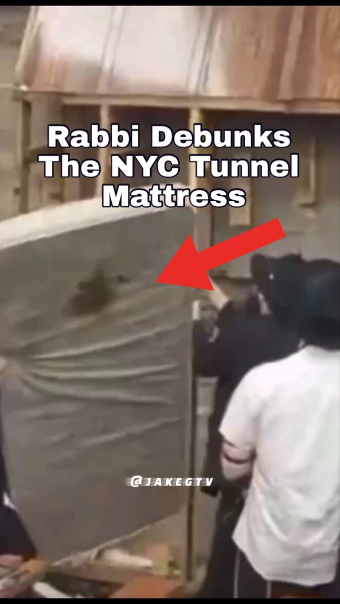 A person in a white shirt is pulling back what appears to be a large sheet or mattress covering an area, with a red arrow pointing to it and overlay text reading "Rabbi Debunks The NYC Tunnel Mattress" with a "@JAKEGTV" watermark. The image relates to the post by referencing the viral NYC tunnel mattress conspiracy theory, which the post author sarcastically dismisses while mentioning financial trades.