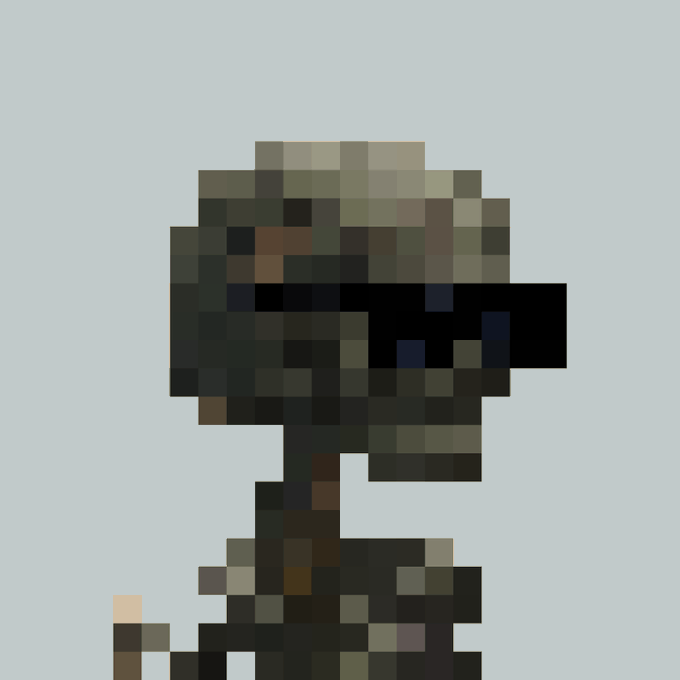 A heavily pixelated image showing what appears to be a figure wearing a hat or helmet, rendered in dark green and black pixels against a light blue background.