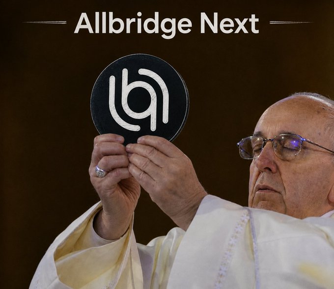 Pope Francis holds up a black circular sign with a white 'ina' (Injective) logo, with the text 'Allbridge Next' at the top.