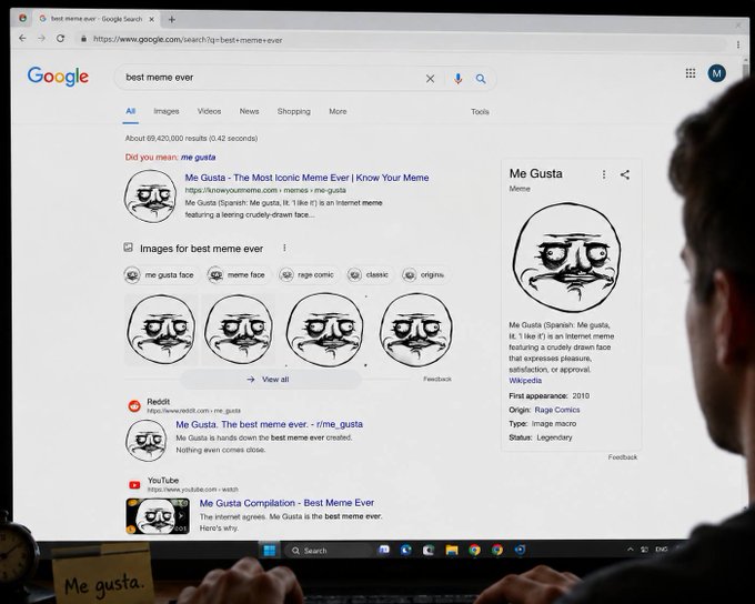 A person searches "best meme ever" on Google, which prominently displays the "Me Gusta" meme as the top result in the knowledge panel, with the "Me gusta." sticky note and $MEGUSTA ticker reinforcing the meme's legendary status.
