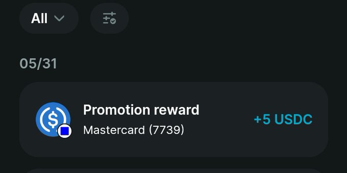 The image shows a black screen displaying a message about a promotion reward for using a Mastercard card. The text indicates that the user has received their first reward by activating the card and making their first purchase with the Bitget Card.