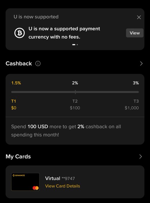 A crypto wallet app interface showing 'U is now supported' with Bitcoin, cashback tiers (T1 1.5%, T2 2%, T3 3%), and a Binance virtual card.