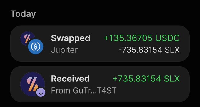 A cryptocurrency transaction history showing a swap of -735.83154 SLX for +135.36705 USDC via Jupiter, followed by a received transfer of +735.83154 SLX from GuTr...T4ST.