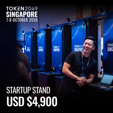 A smiling man wearing a lanyard stands at the TOKEN2049 Singapore Startup Village on 7-8 October 2026, with the promotion highlighting a startup stand available for USD $4,900, directly supporting the post's call for startups to join the world's largest crypto event.