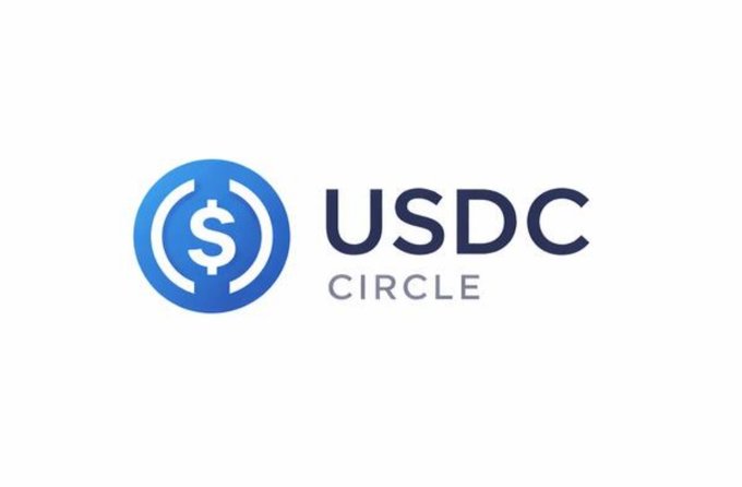 The image displays the USDC logo by Circle, featuring a blue circular icon with a dollar sign beside the bold "USDC" text and "CIRCLE" underneath. This branding aligns with the post's news about Circle receiving final regulatory approval to establish a U.S. national trust bank, marking a significant milestone for the company and the future of regulated stablecoins.