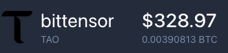 A cryptocurrency ticker display showing 'bittensor' (TAO) priced at $328.97 or 0.00390813 BTC.
