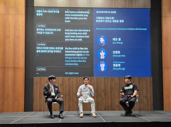 Three men sit on stools on a stage at BLOCKFESTA 2026 for a panel titled 'From Access to Capital: How Tokenization Is Building a New Economy,' featuring speakers Lee Wong, An Kangho (엄강호), and Tony Chung (정용택).