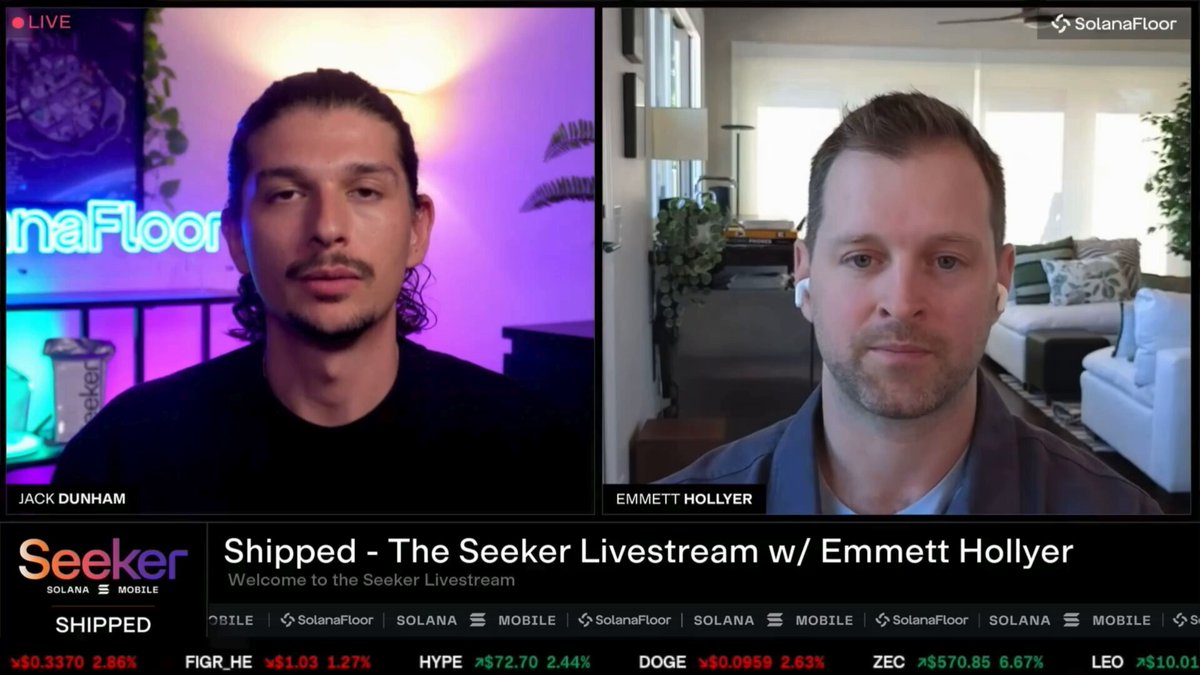 The image shows two men talking about something at a hotel, with one man's name displayed as Jack Dunham who opened Nomadz on Seeker and stated that our hotel rates were much cheaper than bookingdotcom. The other man is named Emmett Holler and they both seem to be having an interesting conversation or making decisions related to travel accommodations.