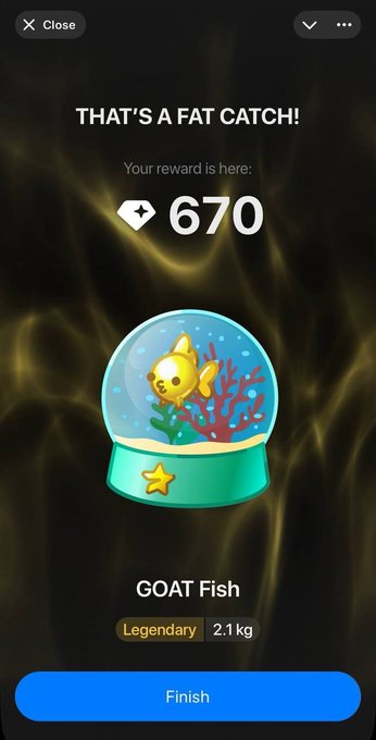 A mobile game screen displaying a reward notification 'THAT'S A FAT CATCH!' with a reward of 670, showing a 'GOAT Fish' described as Legendary and weighing 2.1 kg.