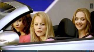 Three blonde women sit in a convertible car, styled as a parody of the "Mean Girls" movie scene, with the caption humorously reimagining it as "Get in loser. We're saving Ethereum." while promoting crypto adoption.