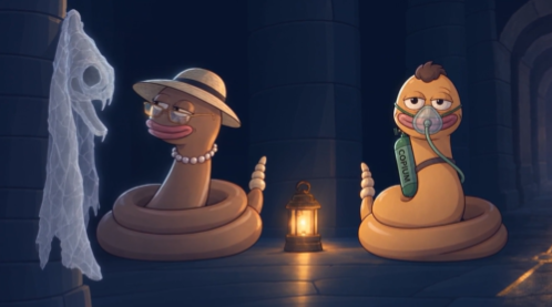 Two cartoon worm-like characters in a dark dungeon setting, one wearing a hat with a lantern and the other holding a green object, facing a ghost-like figure.