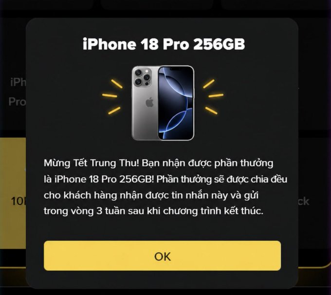 A scam pop-up message claiming the user won an iPhone 18 Pro 256GB as a Mid-Autumn Festival prize, written in Vietnamese, with an 'OK' button.