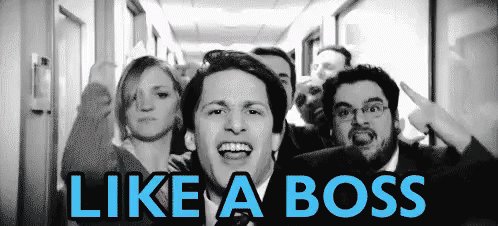 The image features a group of people standing close together, with one person wearing a suit and tie and another person wearing glasses. The text "like a boss" is written above them, which could be interpreted as an advertisement or promotional message for a product or service related to business management or leadership skills.