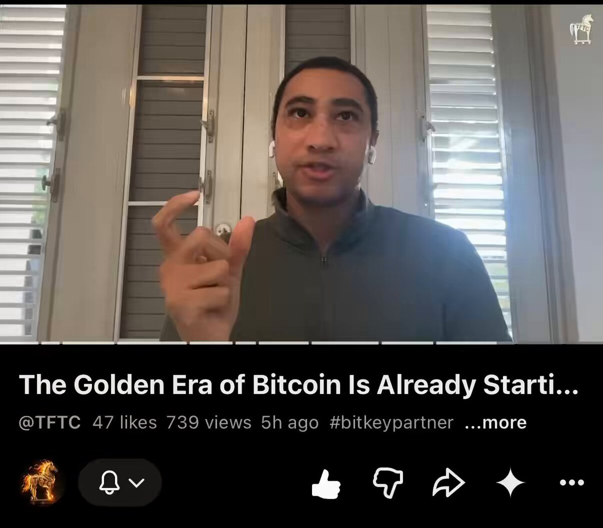 The image features a man wearing a green jacket, giving him an air of authority or expertise. He is pointing at something in front of him while talking about the history of Bitcoin. The caption below his photo reads "Energized MW’s the new precious…. $ANY". This phrase suggests that the man might be discussing the value of Bitcoin as a precious metal, possibly comparing it to gold.