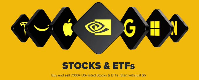 The image features an advertisement for Amazon that includes various products, such as a banana, apple, and laptop. The text "Stocks & ETFs" is written at the top of the image, indicating the focus on stock trading and ETFs. The image also contains a yellow diamond with black squares, which could be interpreted as a symbol related to the stock market or ETFs.