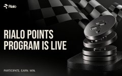 A promotional graphic for "RIALD POINTS PROGRAM IS LIVE" by Rialo, featuring black and white imagery of coins and a checkered flag with the tagline "PARTICIPATE. EARN. WIN."