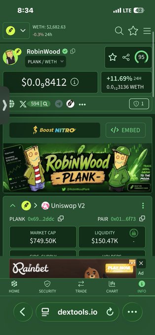 A mobile view of dextools.io showing the RobinWood token (PLANK/WETH) priced at $0.0₅8412, with a market cap of $749.50K and the Uniswap V2 pair details.