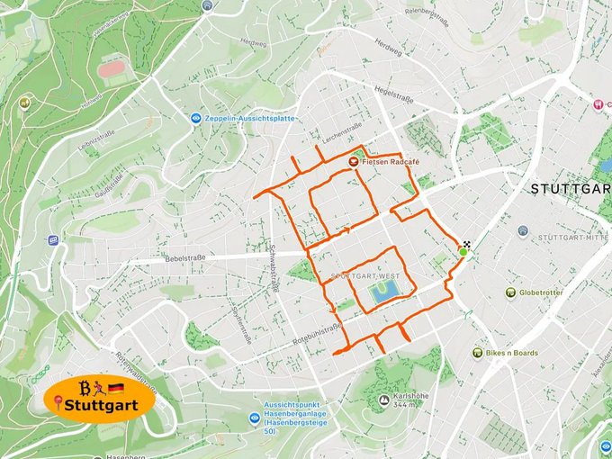 A map of Stuttgart, Germany with an orange route outlining the city center area near Stuttgart West, including labeled landmarks like Zeppelin-Aussichtsplatt and Fielsten Radcafe.