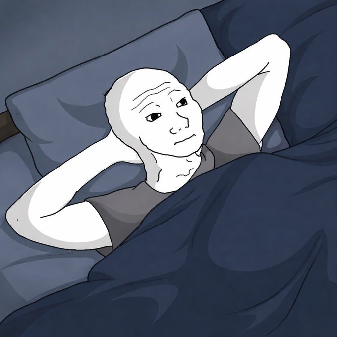 A black-and-white illustration depicts a bald figure lying in bed under blue covers with hands behind their head, wearing a melancholic expression.