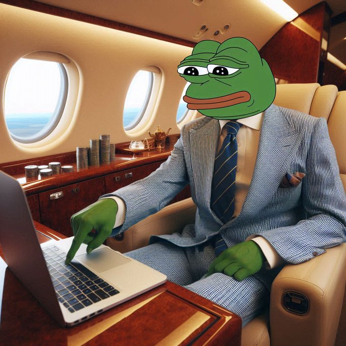 A Pepe the Frog character wearing a gray suit and blue striped tie sits in a private jet working on a laptop, with stacks of coins and teapots on the wooden counter beside him.