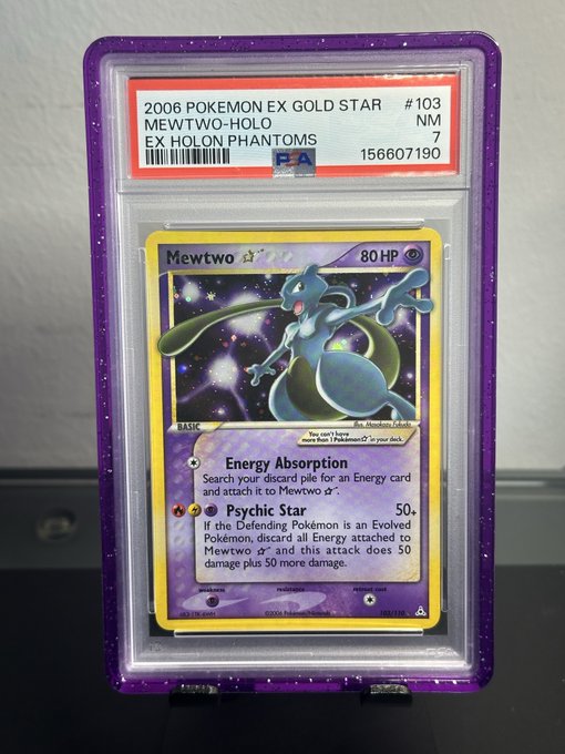 A PSA-graded slab contains a 2006 Pokémon ex Gold Star Mewtwo-Holo card, #103, graded NM 7.