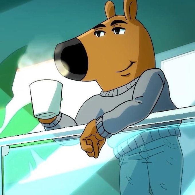 An animated brown bear in a gray sweater and blue jeans casually holds a steaming cup while leaning against a railing, capturing the relaxed "gm" (good morning) vibe of starting the day fresh and energized.

The cozy morning scene with the warm drink pairs perfectly with the post's encouraging message about beginning a new day with good vibes and forward momentum.