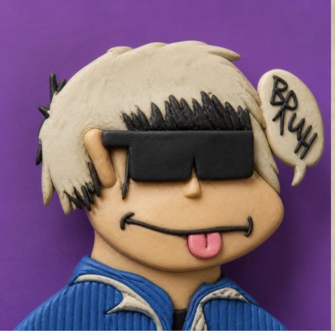 A clay sculpture of a cartoonish character with blonde hair, large black sunglasses, and a pink tongue sticking out, with a speech bubble reading 'BRUH'.