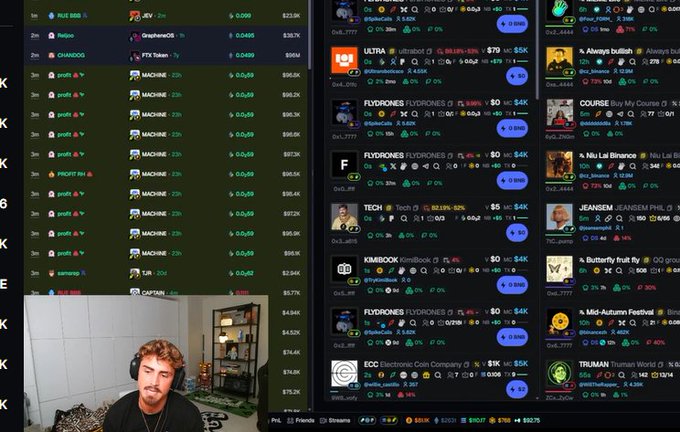 A young man with curly hair sits in a streaming setup showing a screencast of cryptocurrency token lists, with prominent entries including "FLYDRONES" ($0.0000045), "ULTRA" ($75), and "TRUMAN" on what appears to be a trading platform like Phantom or a DEX tracker, aligning with the post's reference to a curated wallet list.