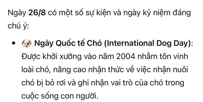 Vietnamese text describes events and holidays on August 26, including 'Ngày Quốc tế Chó (International Dog Day)' which was founded in 2004 to honor dogs and promote adoption awareness.