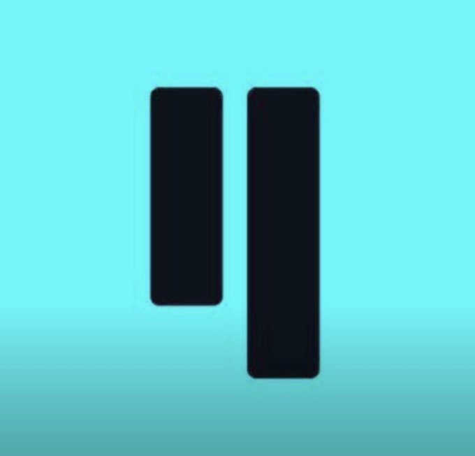 Minimalist graphic featuring a dark grey pause icon composed of two vertical bars centered on a solid light turquoise background.