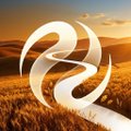 A stylized number '22' logo in silver/chrome over a backdrop of a golden wheat field at sunset.