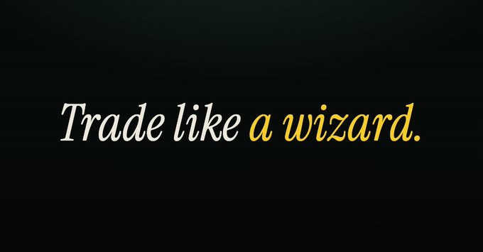 A simple graphic with a dark gradient background displays the text 'Trade like a wizard.' in white and yellow italic font.