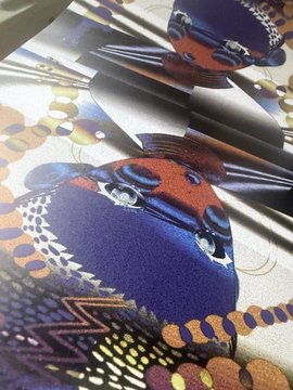 A close-up reveals the intricate pixel details of "Songbird," part of the "INSPIRED: BY US" 1/1 collection, with each piece accompanied by a signed print and bonus extra.