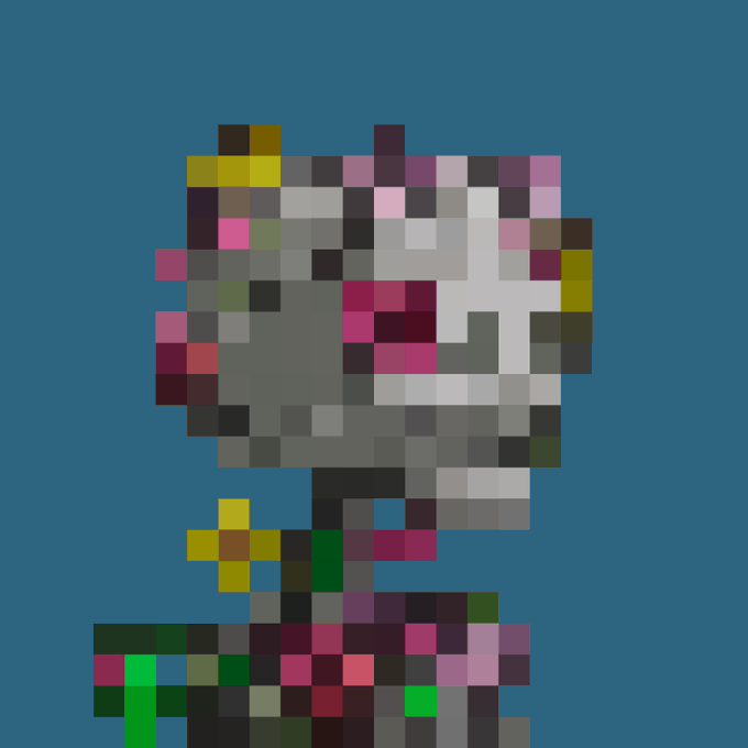 A heavily pixelated, low-resolution image shows a figure with a gray, blocky head featuring pink, white, and yellow accents, set against a solid blue background. The accompanying text "gM Argonauts" suggests this is likely a low-quality sprite or icon related to a character, team, or game entity called "Argonauts," though the extreme pixelation obscures any clear identifying details.
