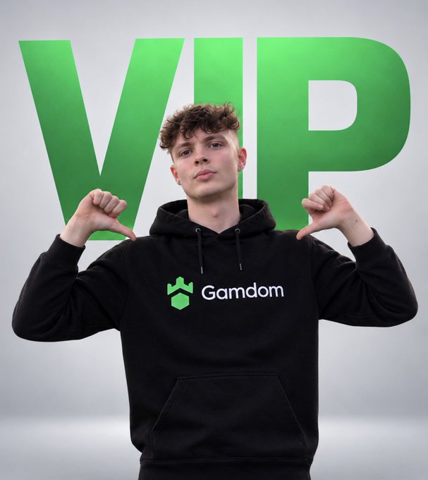 A young man wearing a black "Gamdom" hoodie points both thumbs down in front of a large green "VIP" backdrop. The image visually emphasizes his elite status, supporting the post's claim of being a "chad" by projecting a confident, bragging-high persona as a top-tier user.