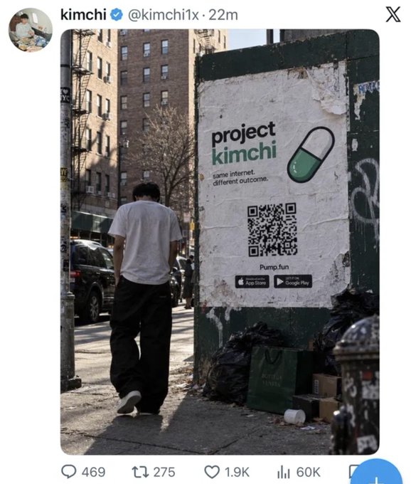 A Twitter/X post by verified **kimchi (@kimchi1x)** shows a street poster advertising **“project kimchi”** with the tagline **“same internet, different outcome.”**, a QR code, **“Pump.fun,”** and App Store/Google Play badges. The accompanying caption says **“Kimchi got hacked few minutes ago,”** suggesting the post is being used as evidence or commentary about a recent hack, though the image itself shows an advertisement rather than the hacking incident.