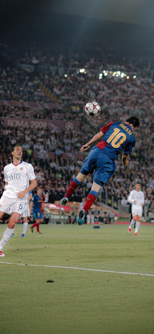 Lionel Messi, in Barcelona's #10 kit, performs a leaping header during a match against Manchester United at the 2009 Champions League Final in Rome.