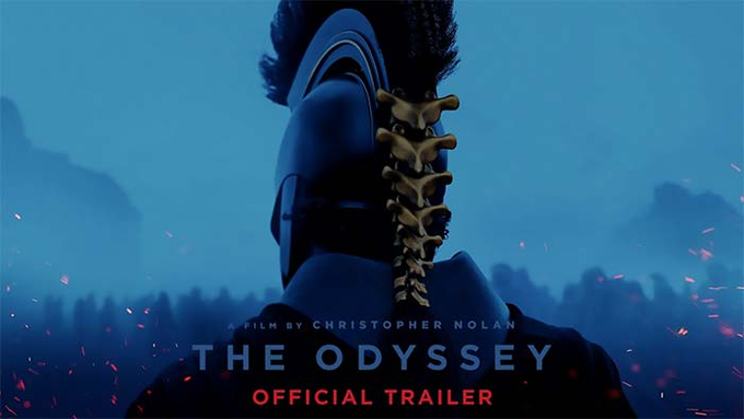 Promotional artwork for 'THE ODYSSEY' official trailer by Christopher Nolan, depicting a warrior in a plumed helmet with intricate spinal back armor against a blue, ember-filled battlefield.