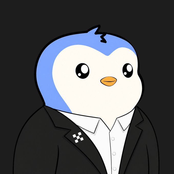 A cartoon penguin mascot with a blue and white head and orange beak is depicted wearing a formal black suit jacket over a white dress shirt, featuring a small checkered logo on the lapel. The image, posted with Chinese text about favorites getting together with tagged accounts @pudgypenguinsCN and @okxchinese, appears to represent the Okx exchange's mascot in a playful partnership with Pudgy Penguins.