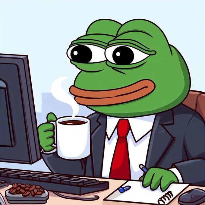 A cartoon illustration of Pepe the Frog dressed in a suit and red tie, holding a coffee mug at a desk with a computer monitor, with coffee beans nearby.